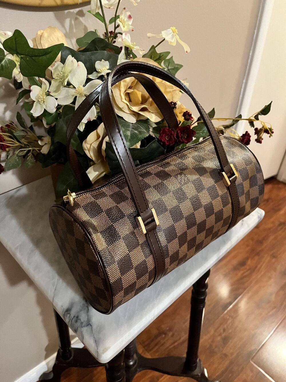 Louis Vuitton Papillon handbag in Damier Ebene coated canvas.